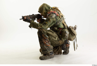 Photos John Hopkins Army Postapocalyptic Suit Poses aiming the gun…